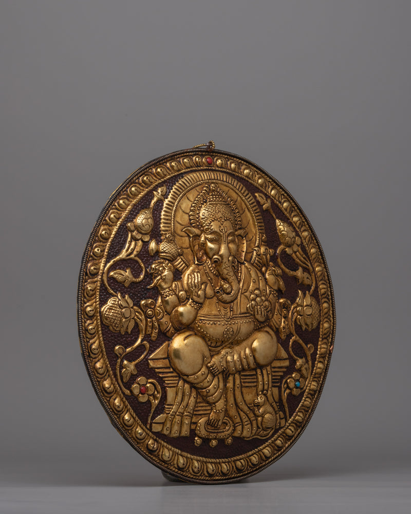 Spiritual Lord Ganesha Metal Thangka | Hand-Carved Brass Artwork with Gold Detailing