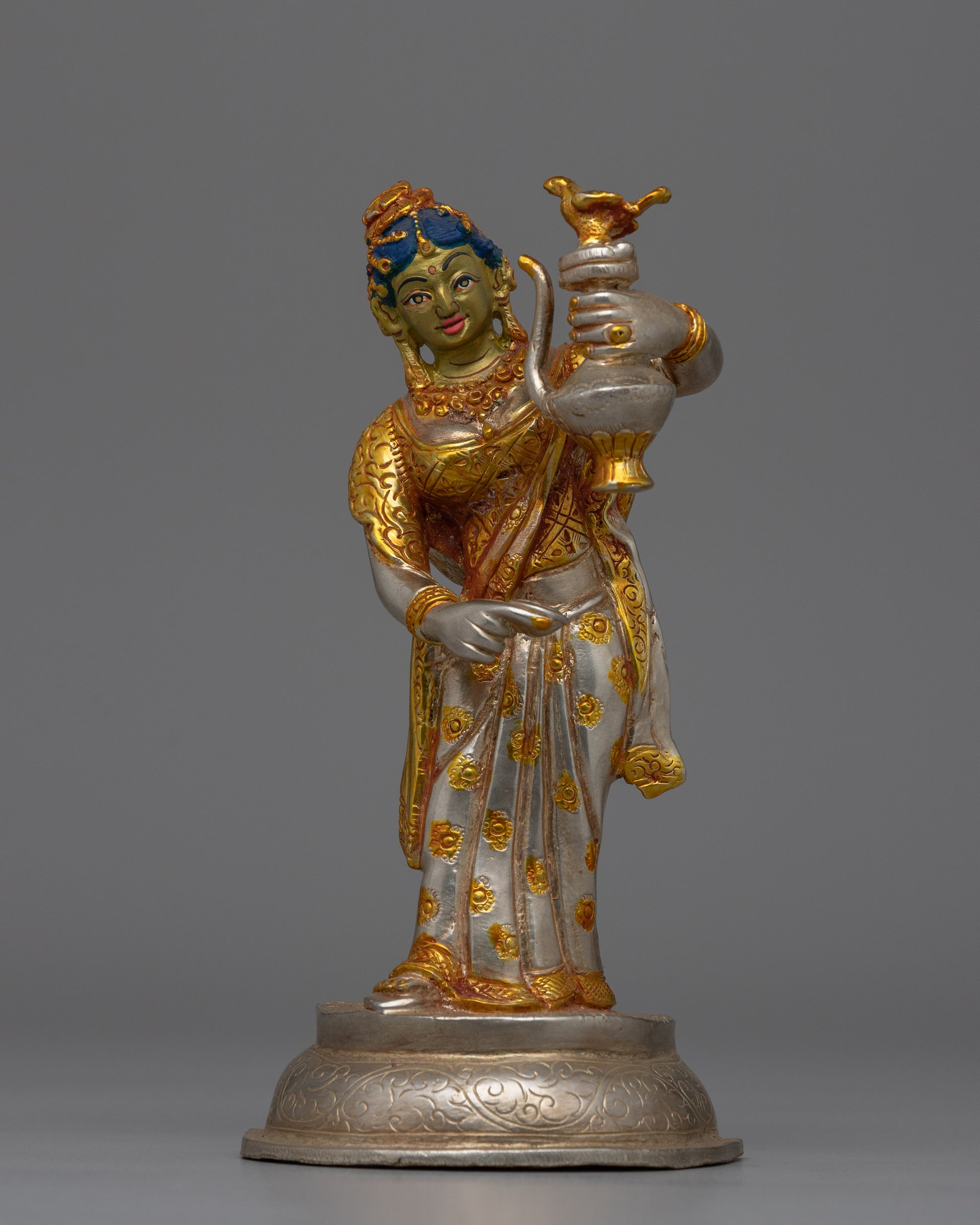 Newari Traditional Clad Silver & Gold-Plated Statue