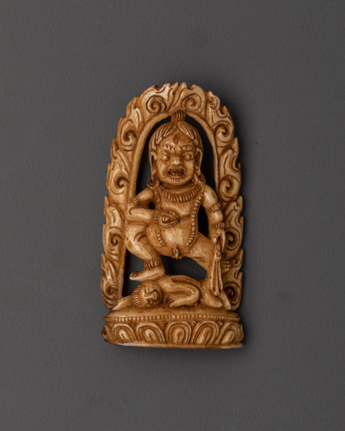 Black Dzambhala Tibetan Carved Plaque | Buddhist Wealth Deity Artwork