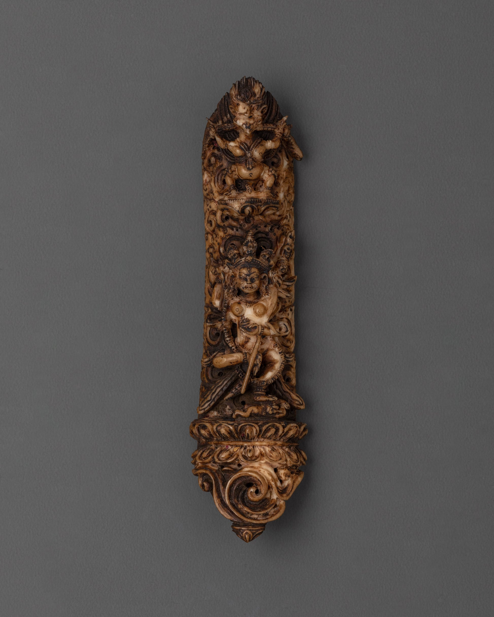 Sacred Bone Carving with Divine Deities