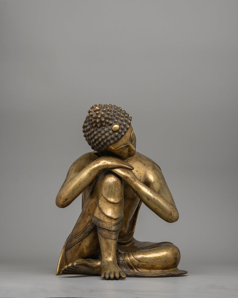 Buddha Statue with Head Resting on Knee