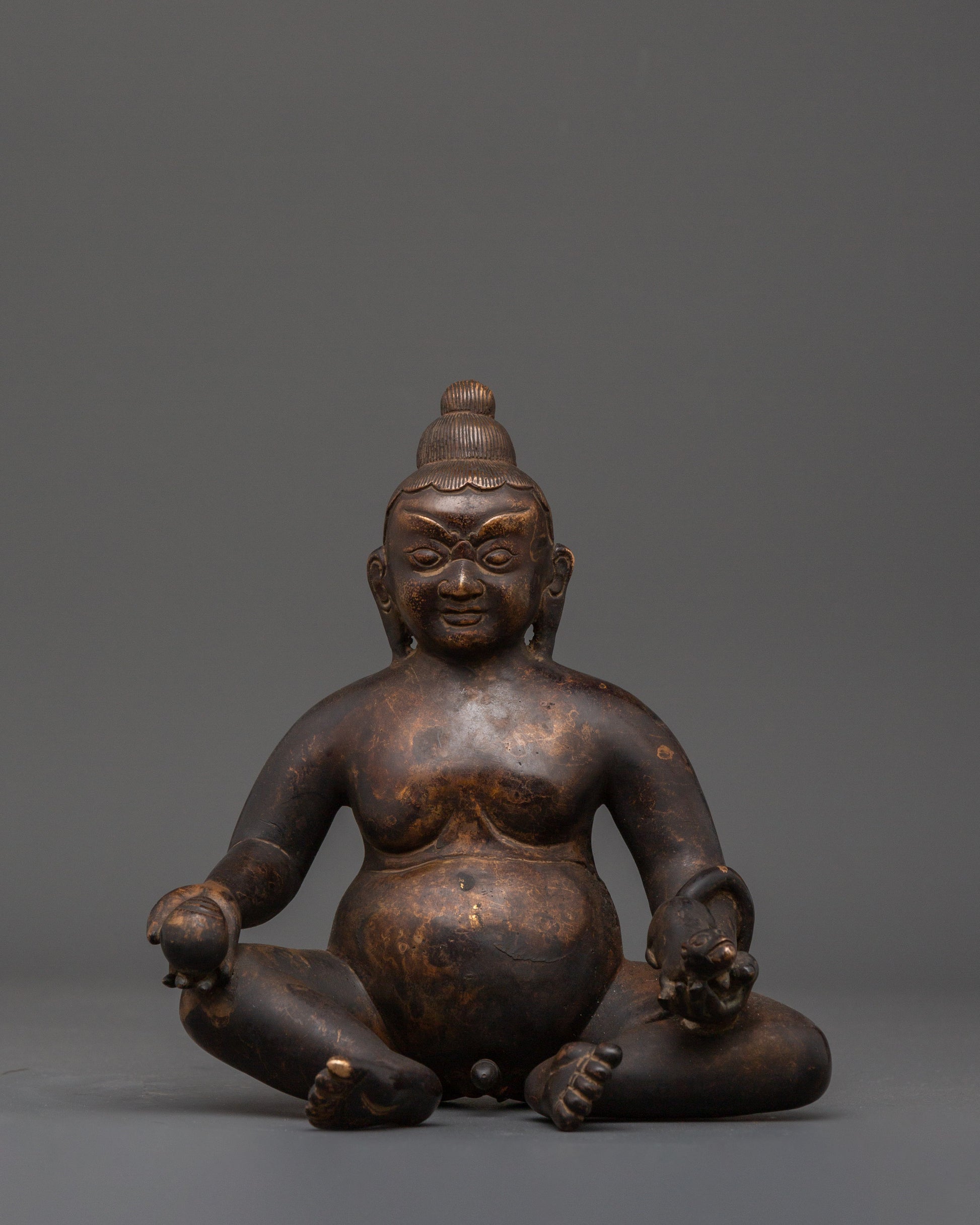 black-dzambhala-oxidized-copper-statue