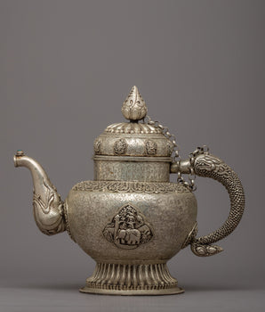 Auspicious Symbol Carved Silver Plated Tea Pot - Evamratna