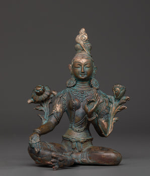 peaceful green tara statue