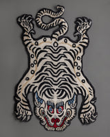 white-black-knotted-tiger-rug