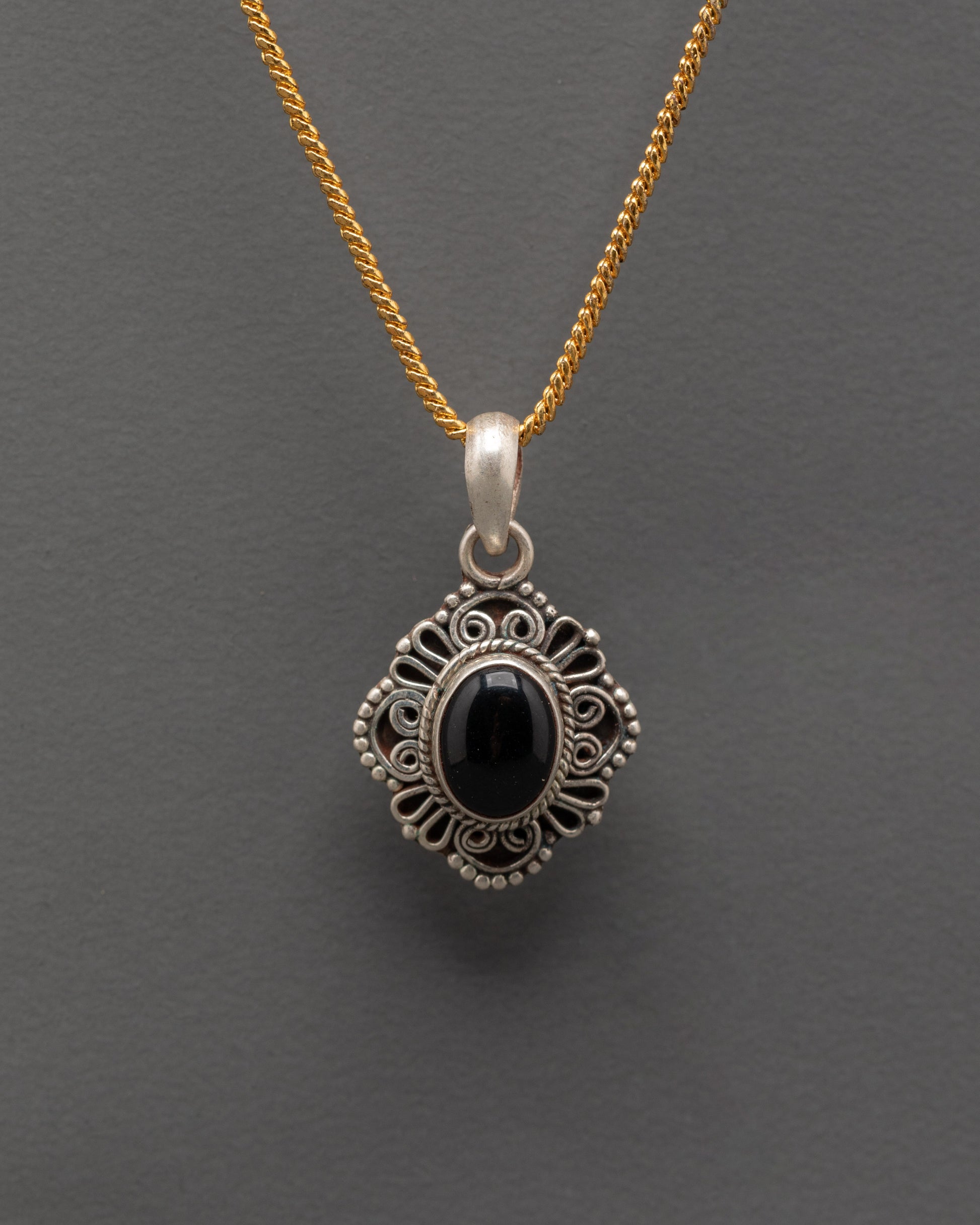 Spiritual silver locket 