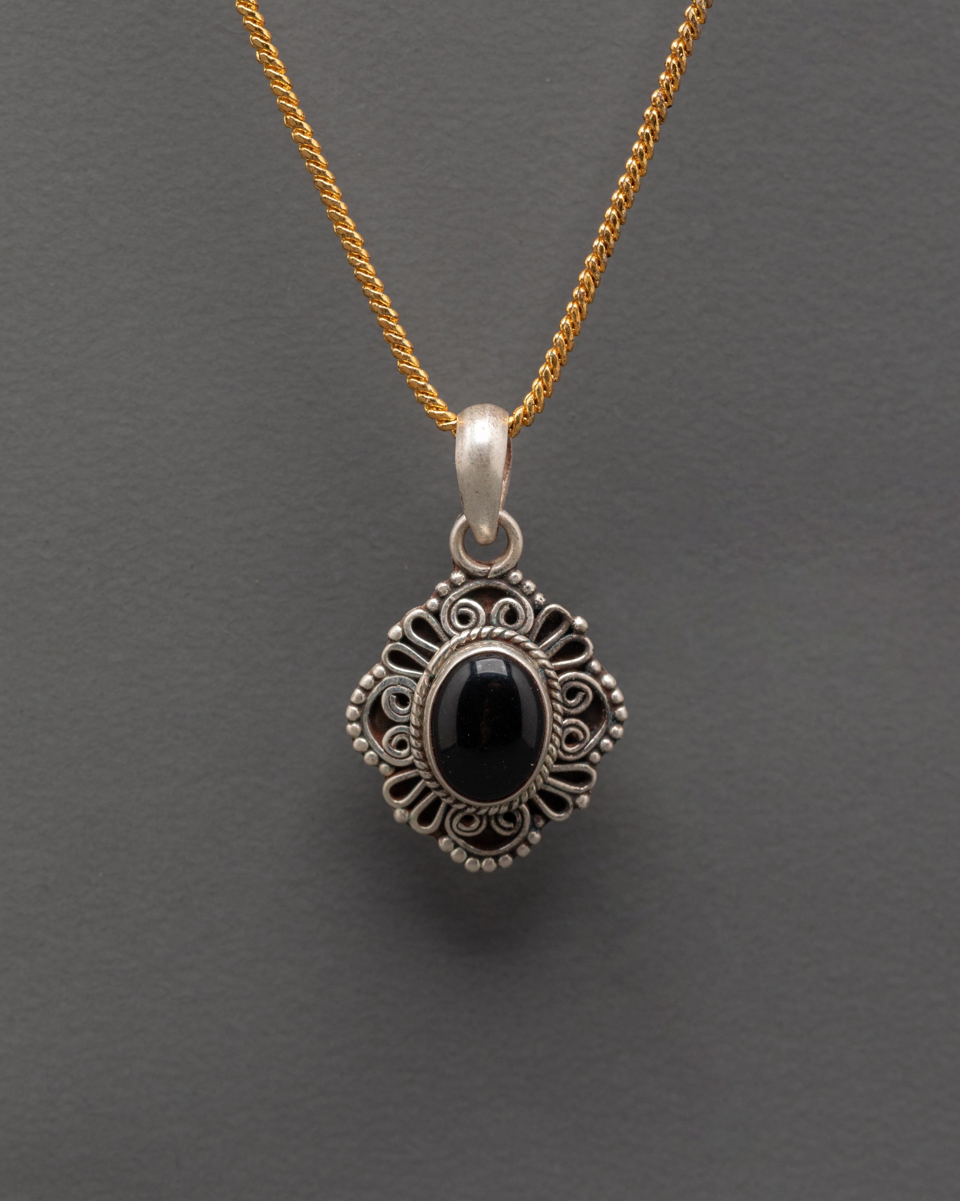 Spiritual silver locket 