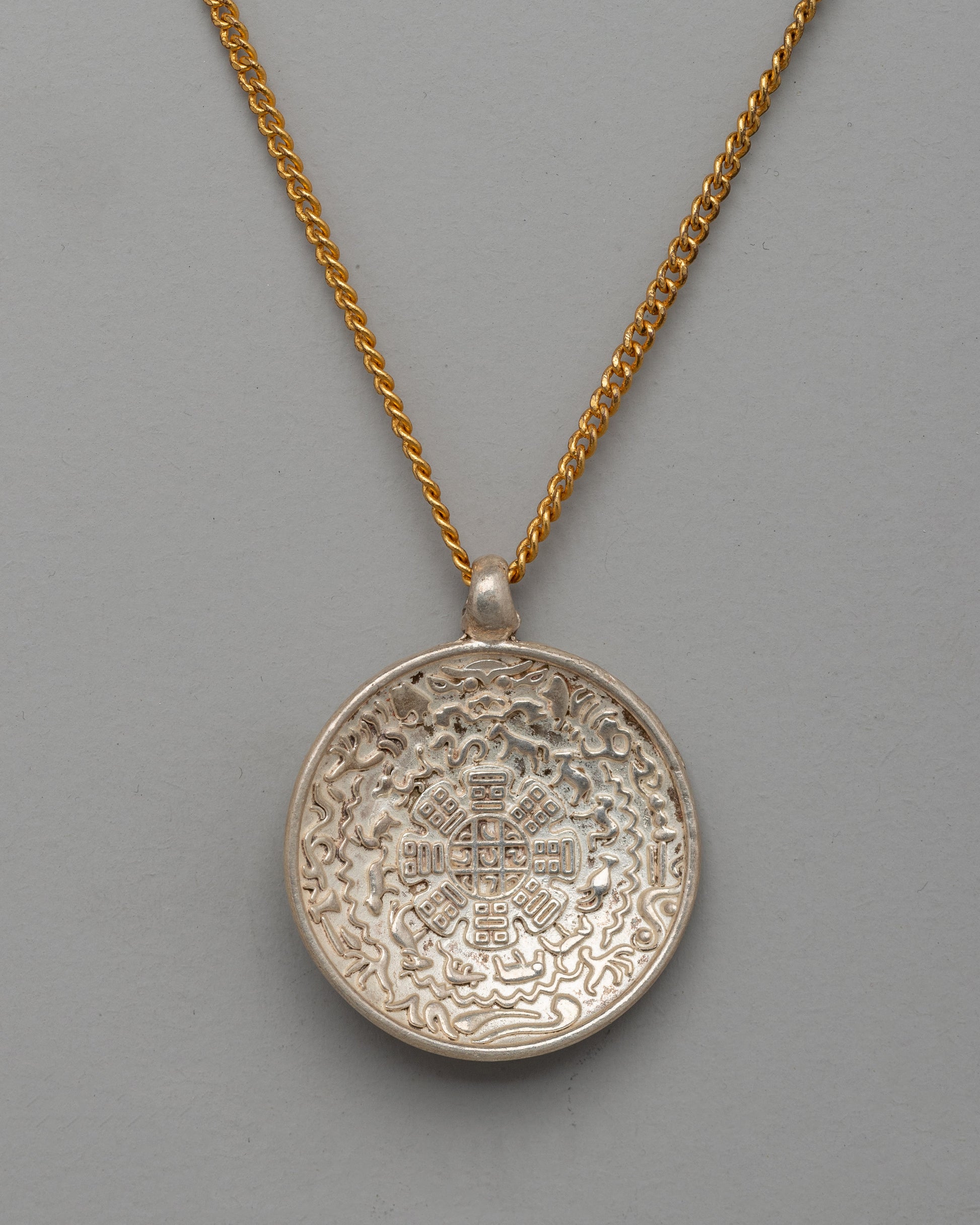 silver-locket-with-chinese-zodiac-symbols
