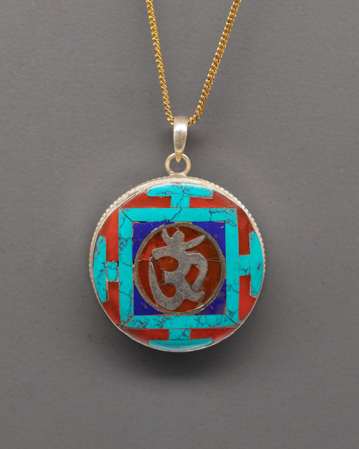Turquoise Om Symbol Pendant