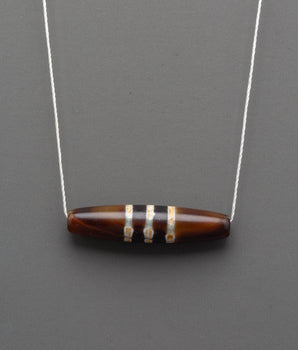 Dzi Bead Jewelry | Sacred Amulet for Protection