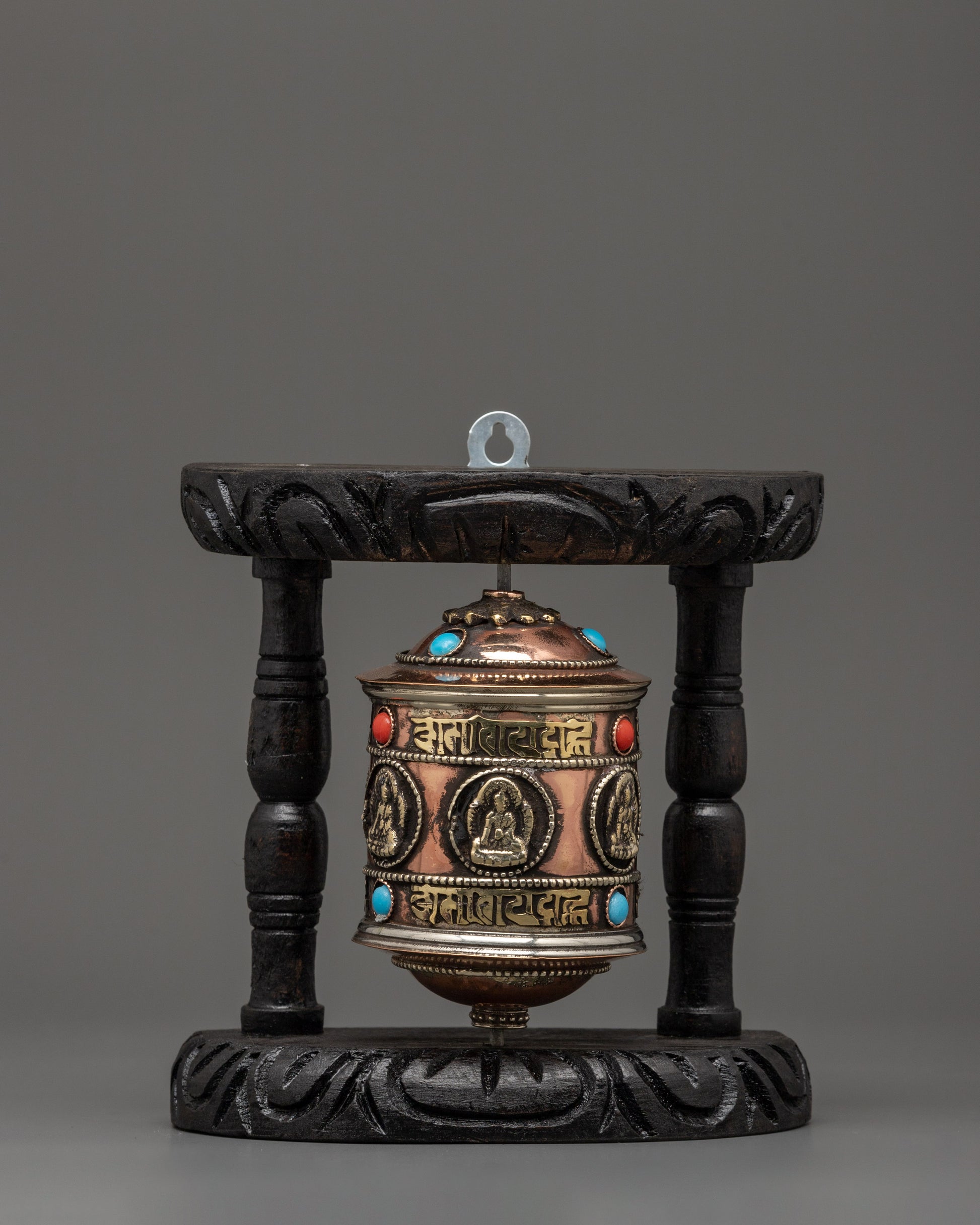 prayer-wheel with carved mantras