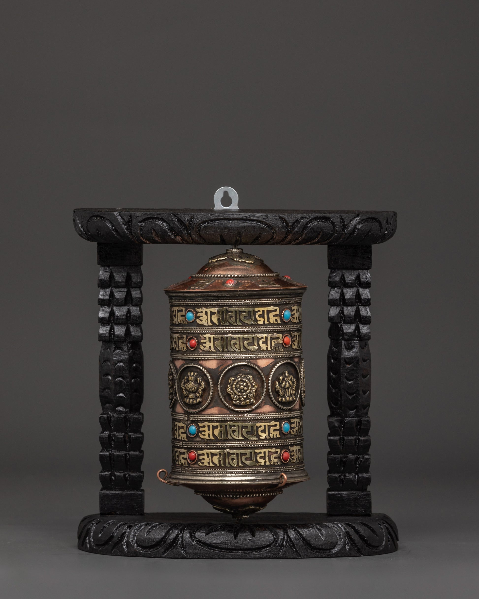 prayer-wheel-featuring-buddhist-auspicious-symbols