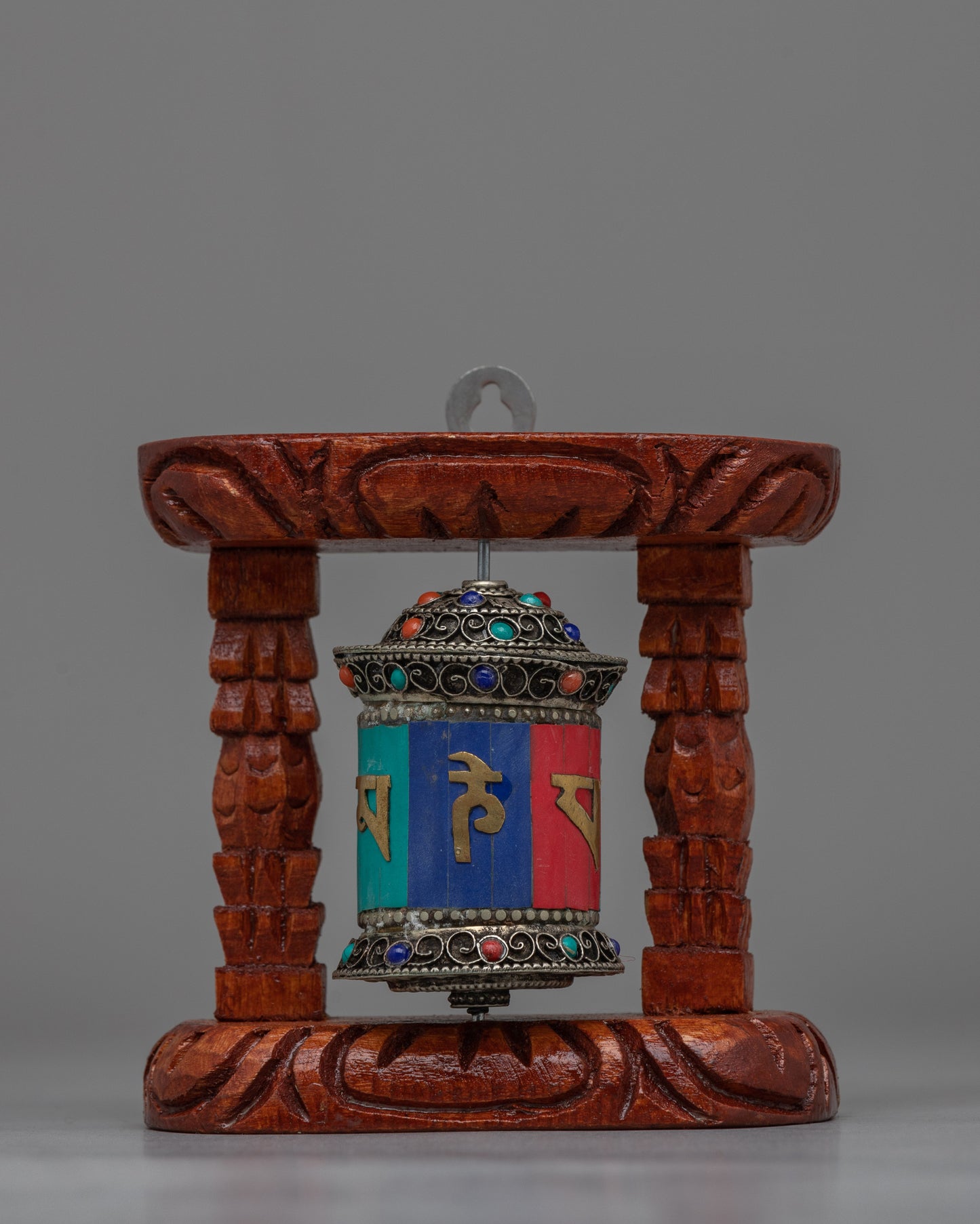 Compact Copper Prayer Wheel with Mantras and Stones