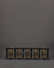 Five Tibetan Prayer Wheels on a Wooden Frame