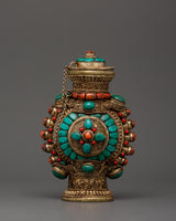 Coral inlaid snuff bottle