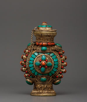 Coral inlaid snuff bottle
