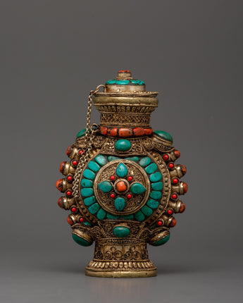 Coral inlaid snuff bottle