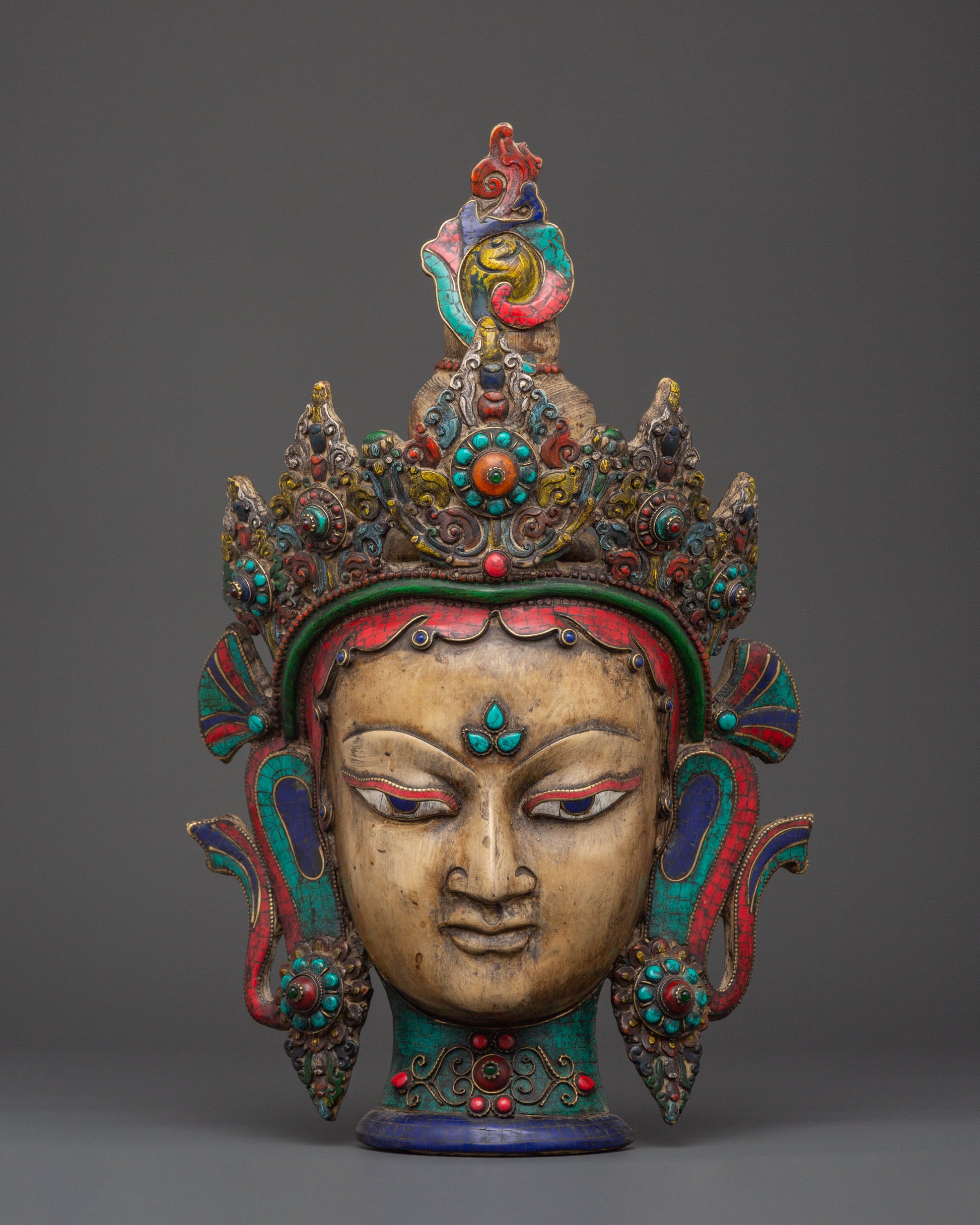Colorful deity wall hanging mask