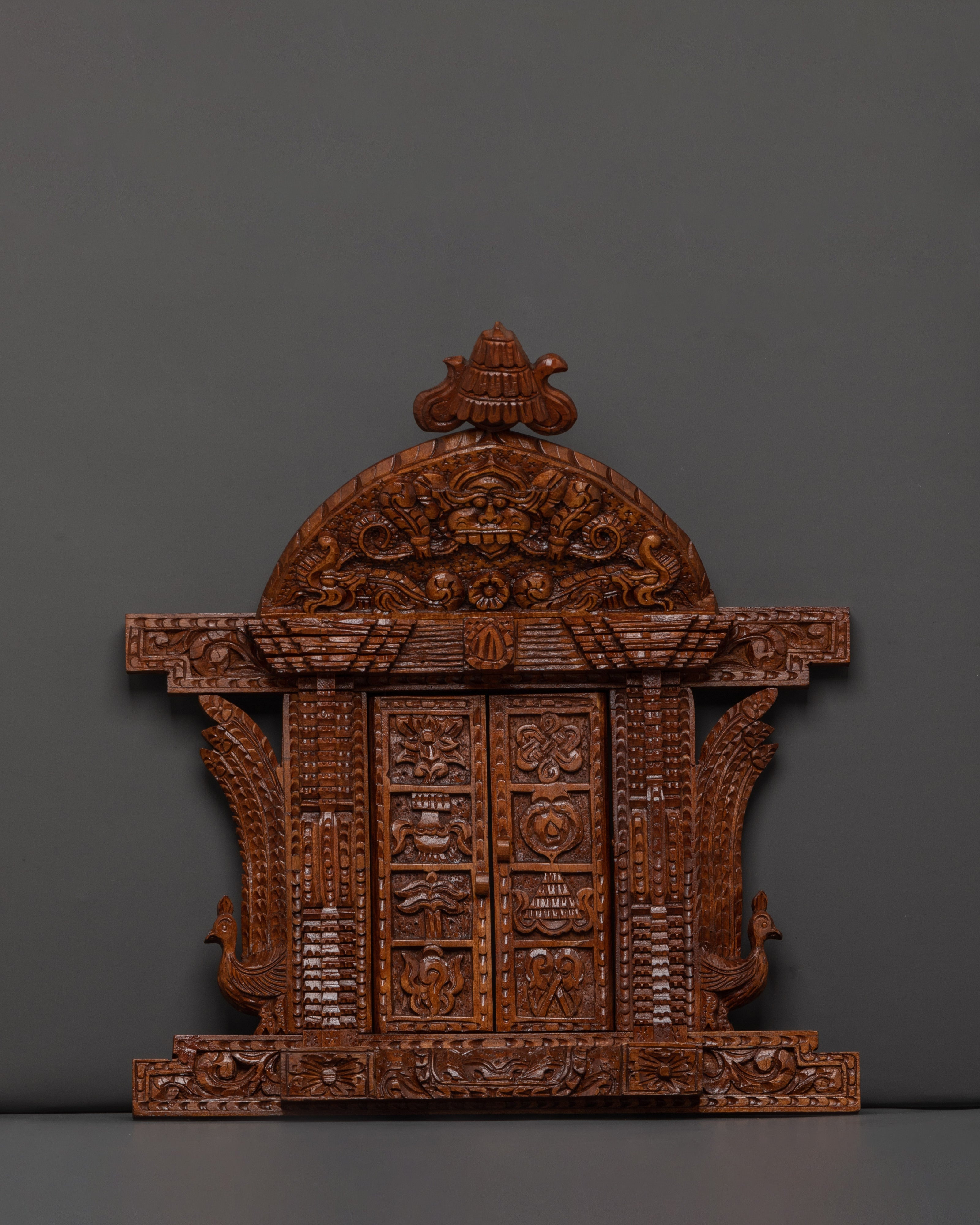 auspicious symbols engraved wall hanging