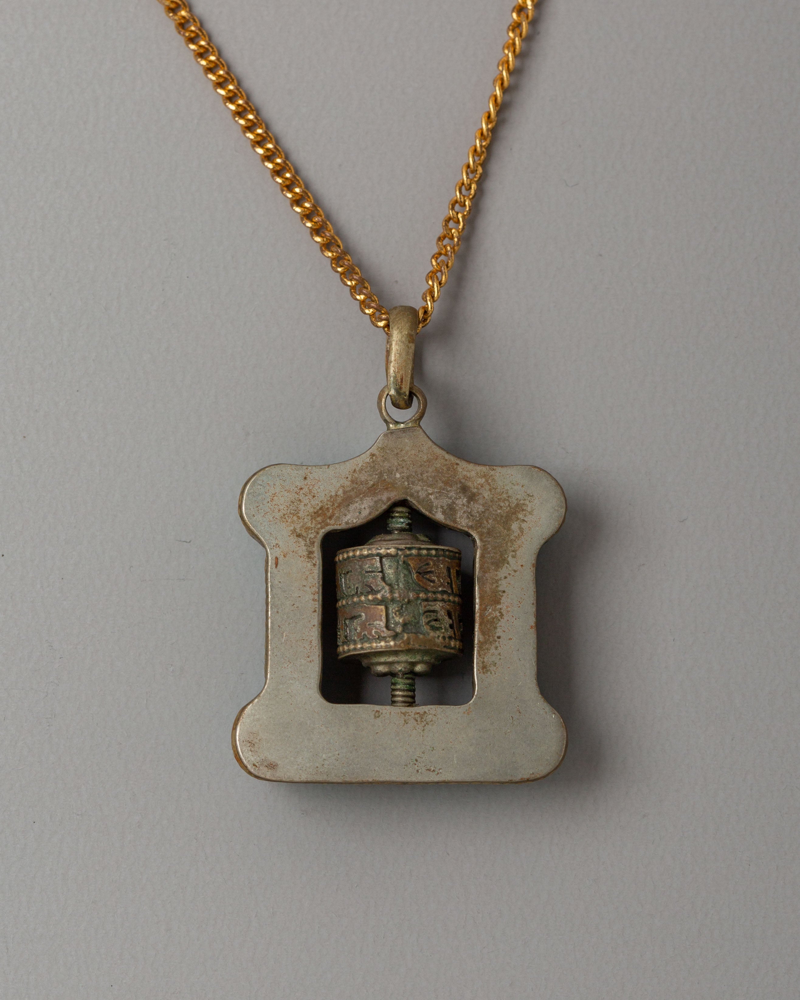 Tibetan Prayer Wheel Locket | Spiritual Amulet for Meditation