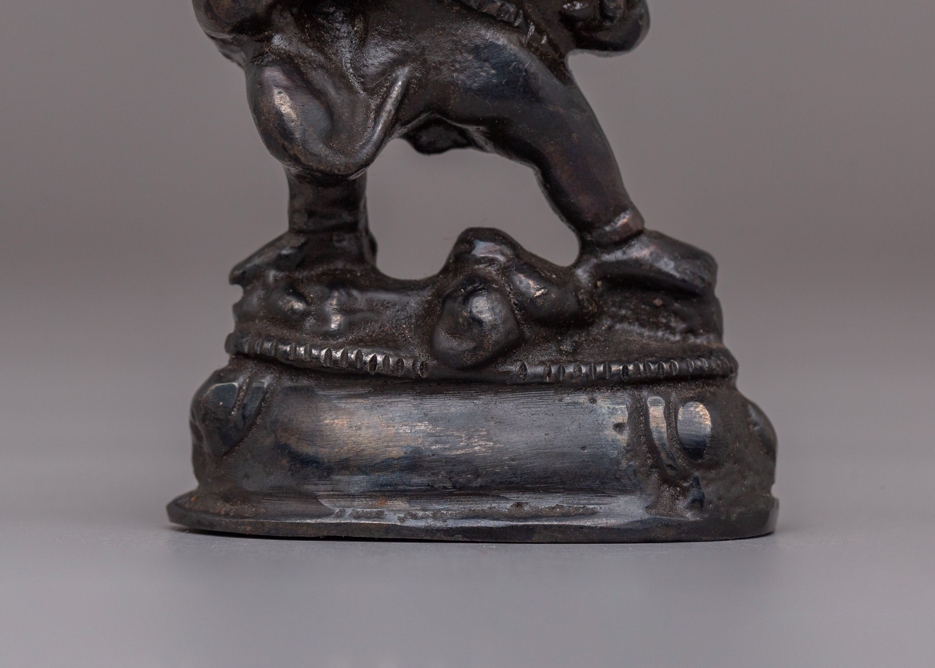 Traditional Black Dzambhala Deity Statue | Handcrafted Iron Sculpture