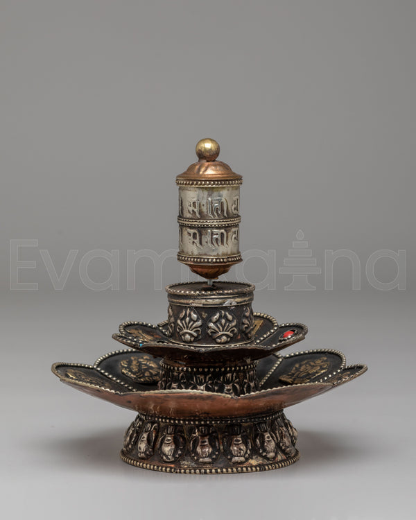 Tibetan Prayer Wheel on Floral Base | Spiritual Symbol of Compassion and Blessings