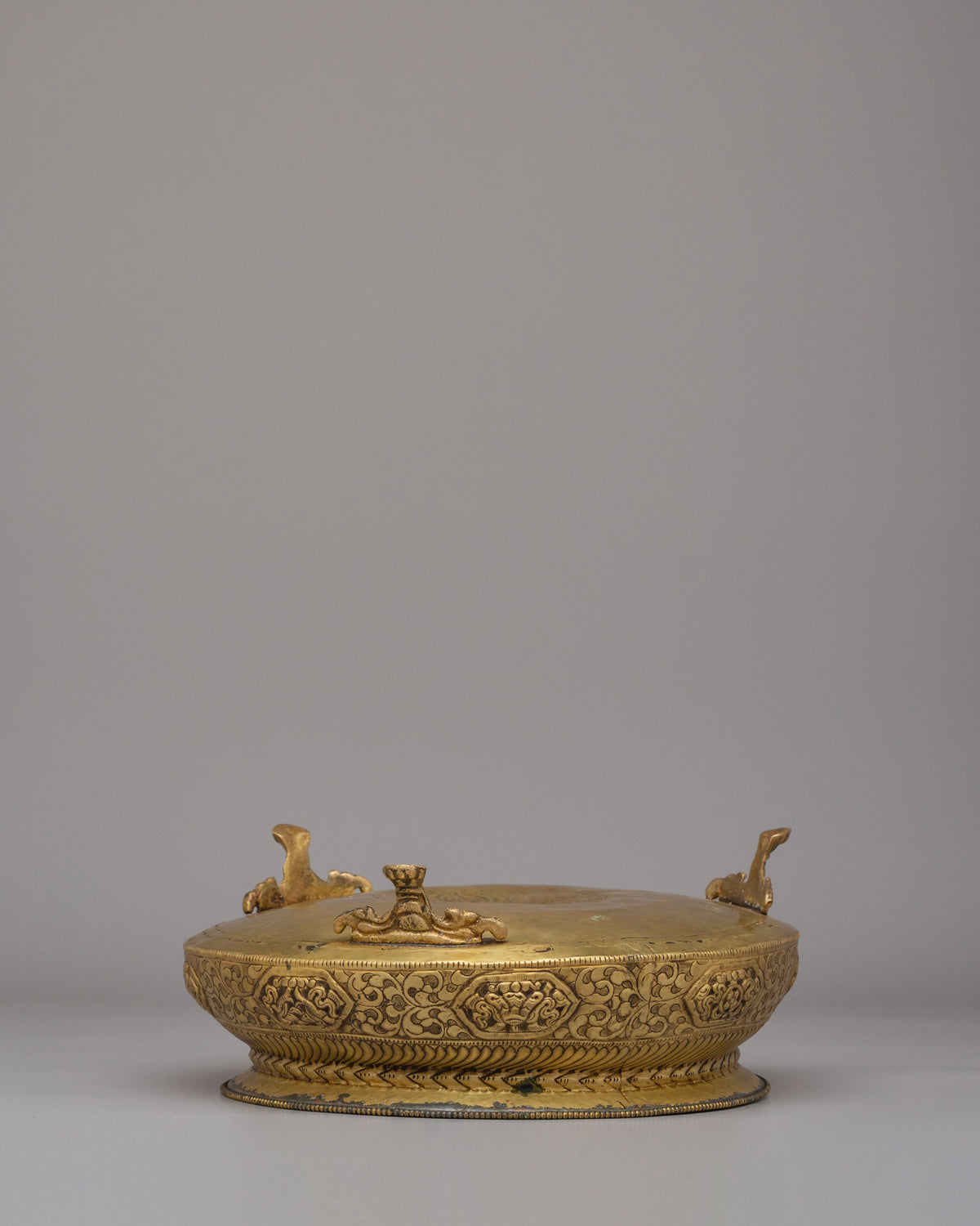 Decorative Urli Bowl | Brass Vessel with Auspicious Symbol Carving