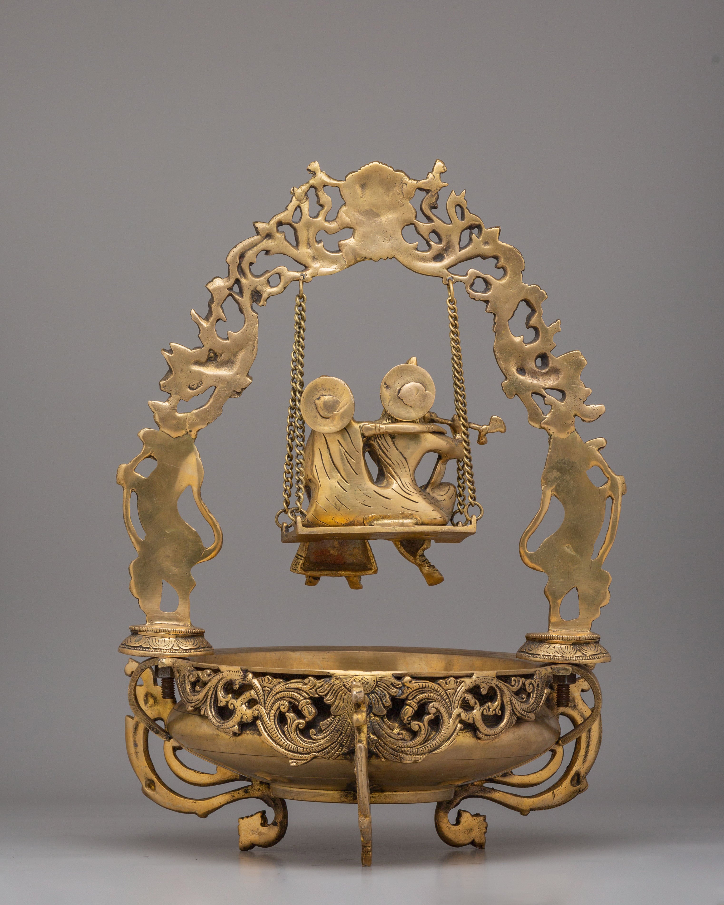 Radha Krishna Jhoola Urli | Decorative Brass Swing Url Bowl