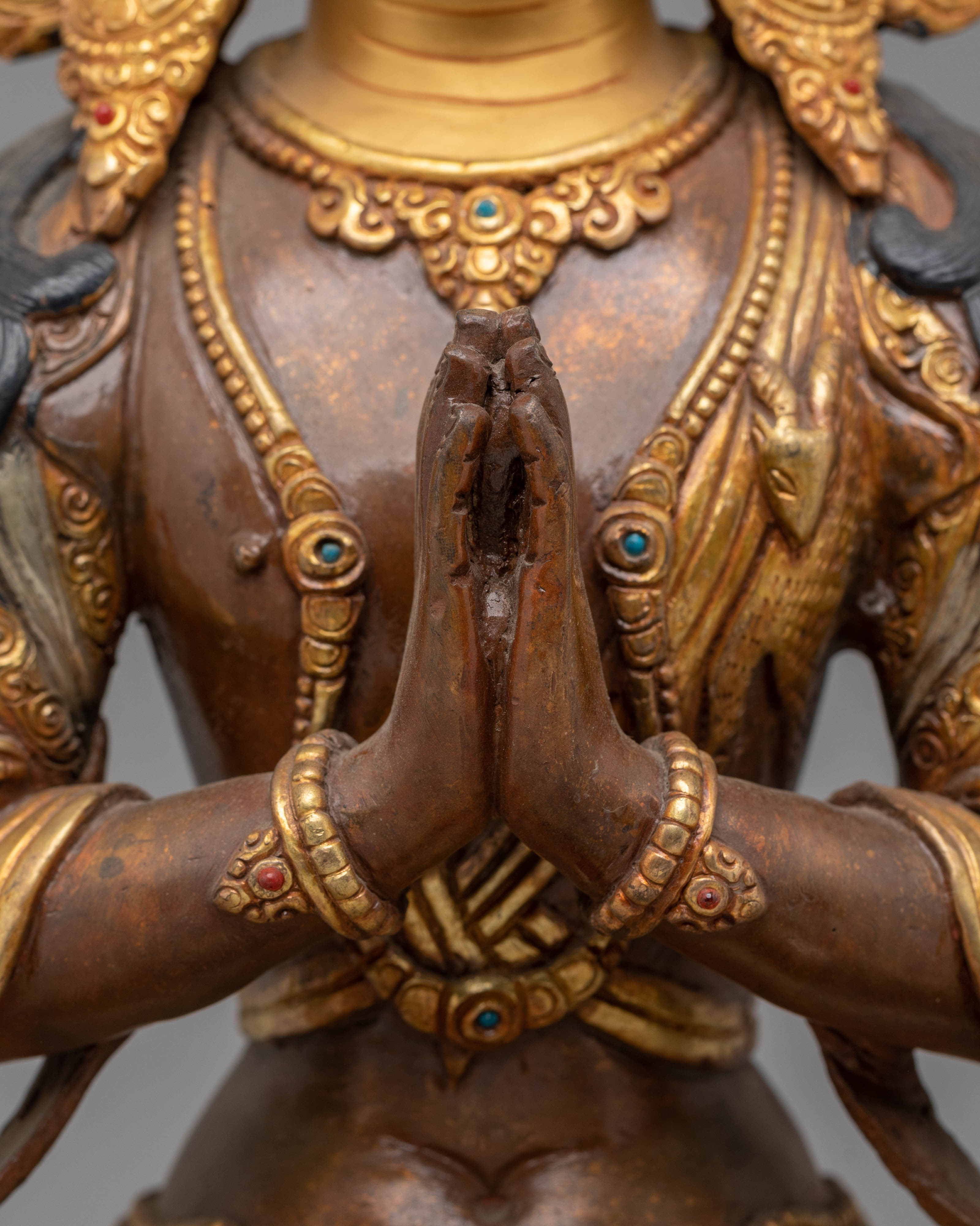 Handcrafted Copper Sculpture of Chenrezig with 24K Gold Gilding and Silver Plating