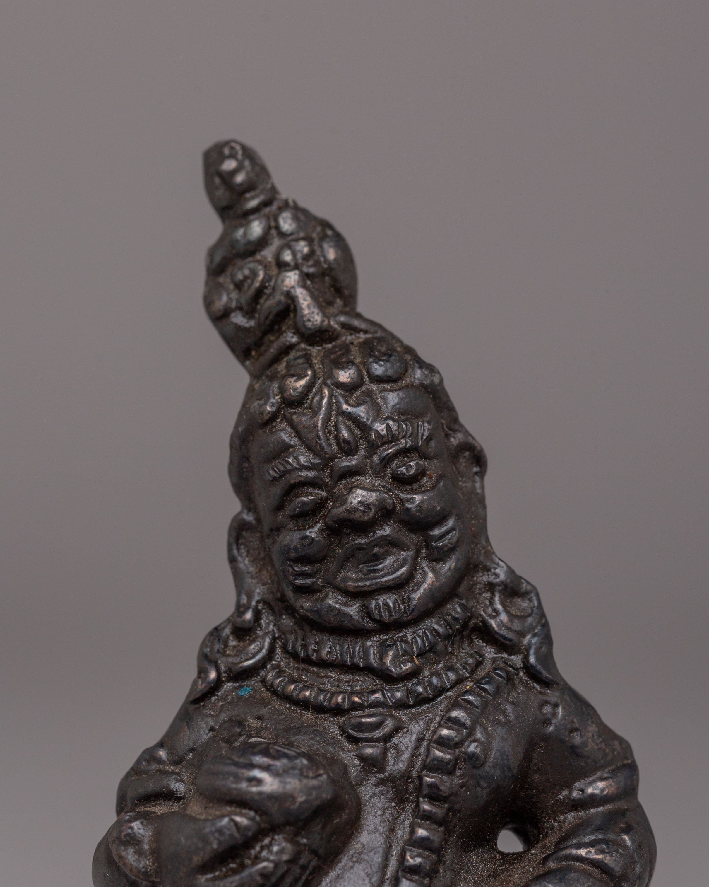 Traditional Black Dzambhala Deity Statue | Handcrafted Iron Sculpture