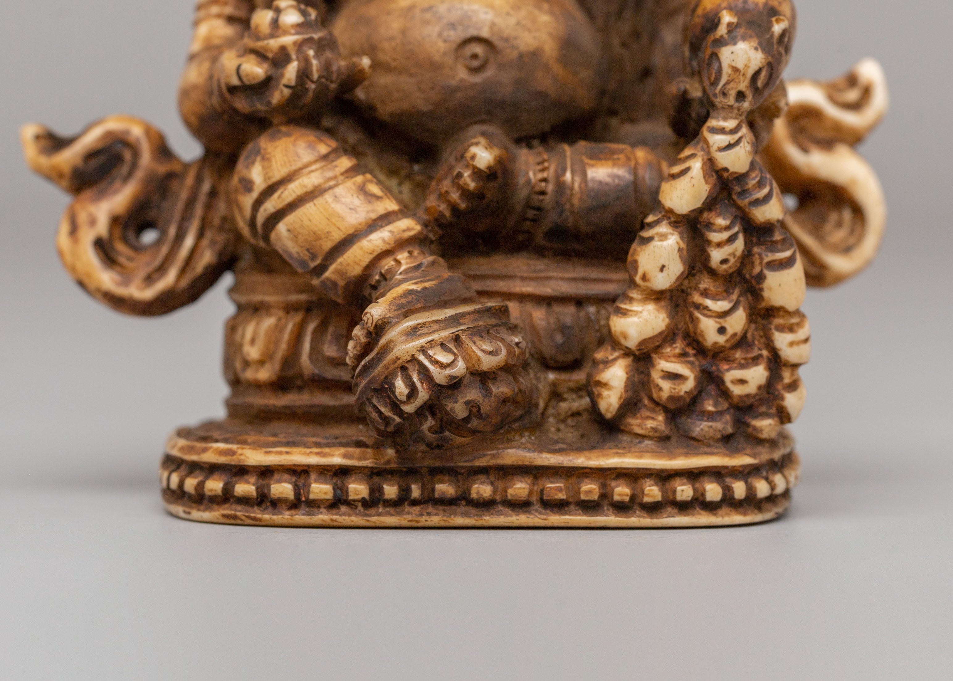 Buddhist Dzambhala Wealth Deity Sculpture | Buffalo Bone Buddhist Sculpture