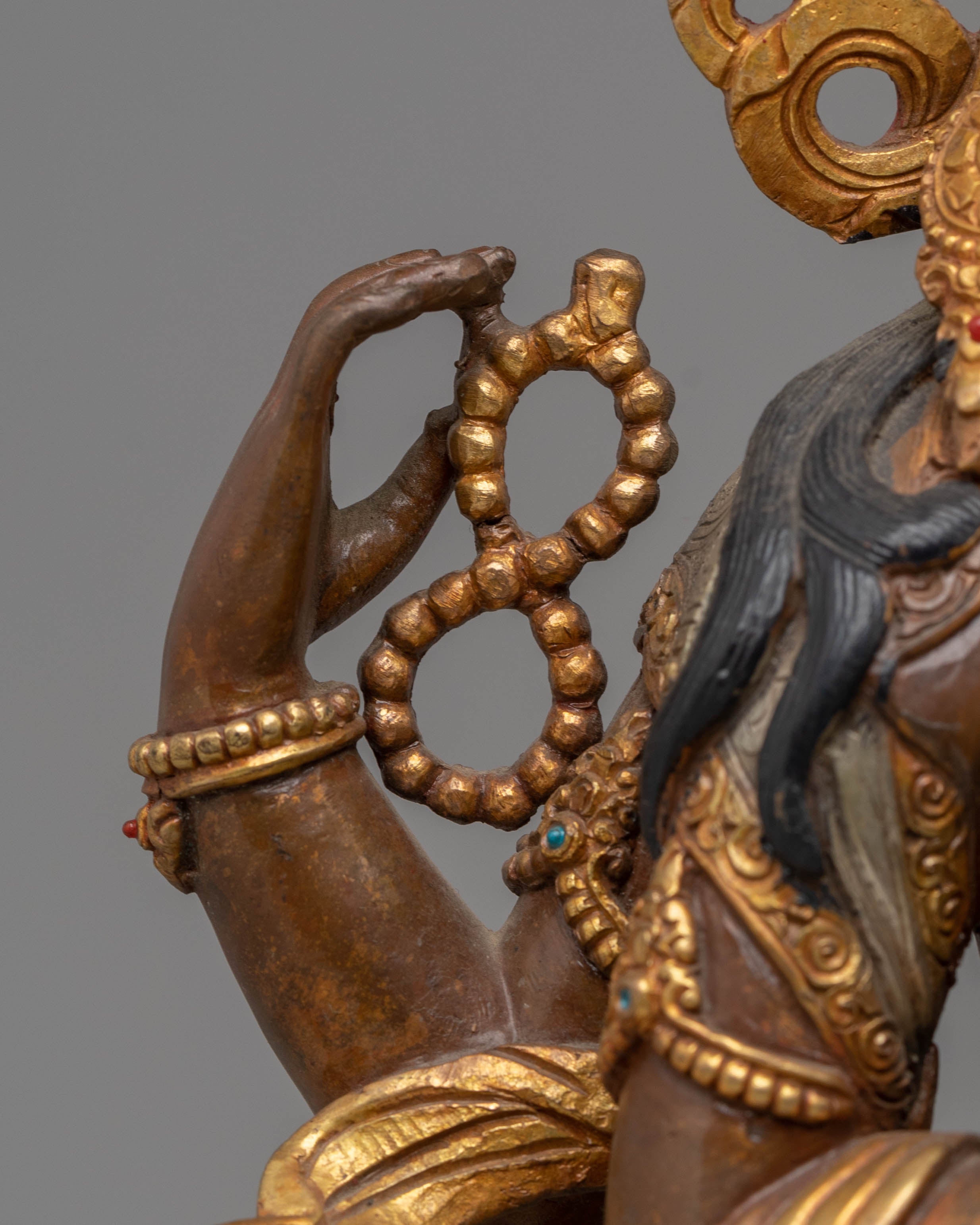 Handcrafted Copper Sculpture of Chenrezig with 24K Gold Gilding and Silver Plating