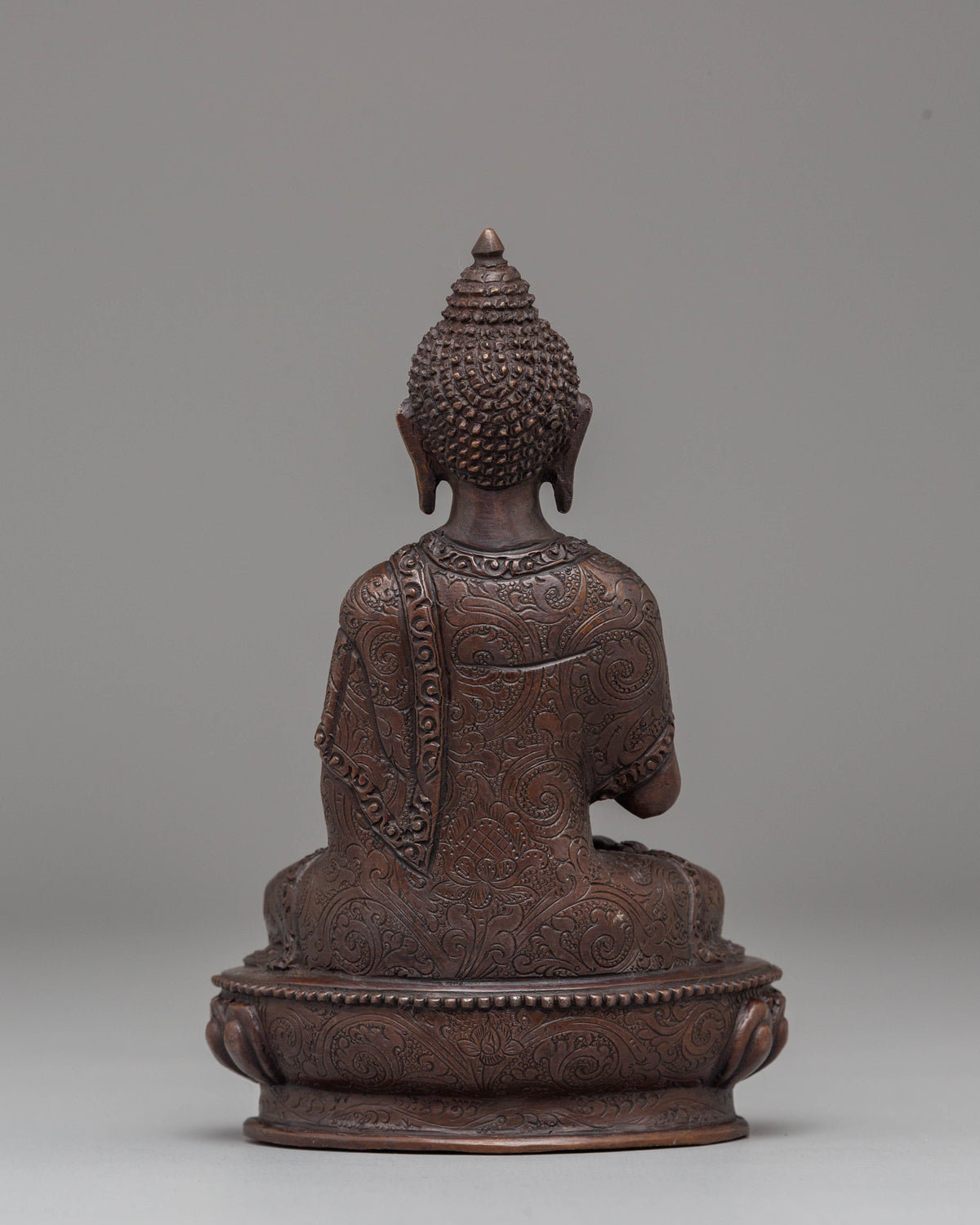 Oxidized Copper Handcrafted Vairocana Sculpture: Cosmic Buddha