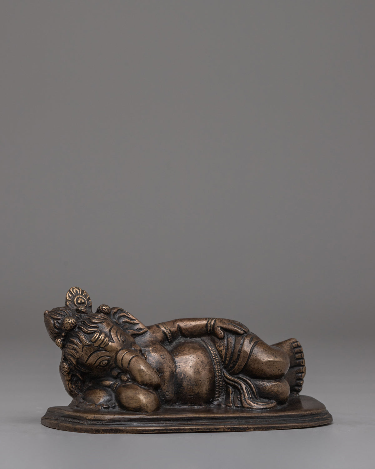 Spiritual  Reclining Ganesha Statue | Handcrafted Bronze Lord Ganesh Sculpture