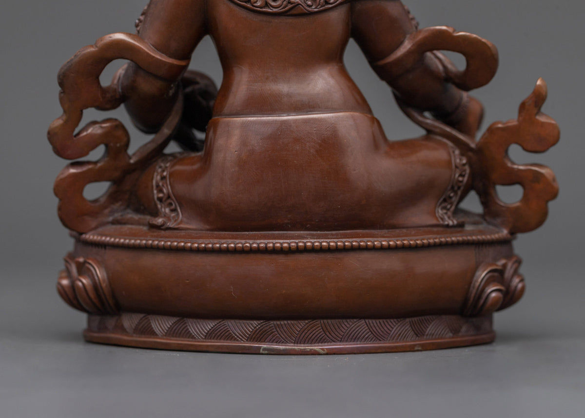 Sacred Dzambhala Figure | Oxidized Copper Buddhist Wealth Deity Sculpture