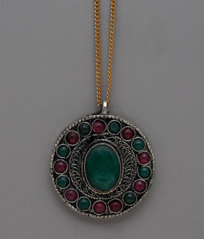 Brass Locket with Coral and Turquoise Accents 